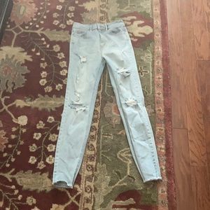 Ripped jeans, sized 0, brand new! :)